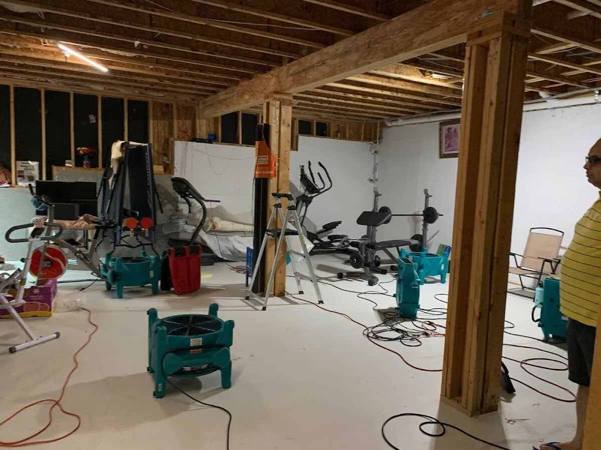 Basement drying equipment setup for Contents Cleaning & Restoration in Schaghticoke
